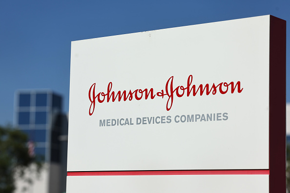 Photo shows Johnson & Johnson sign in front of building/Getty Images